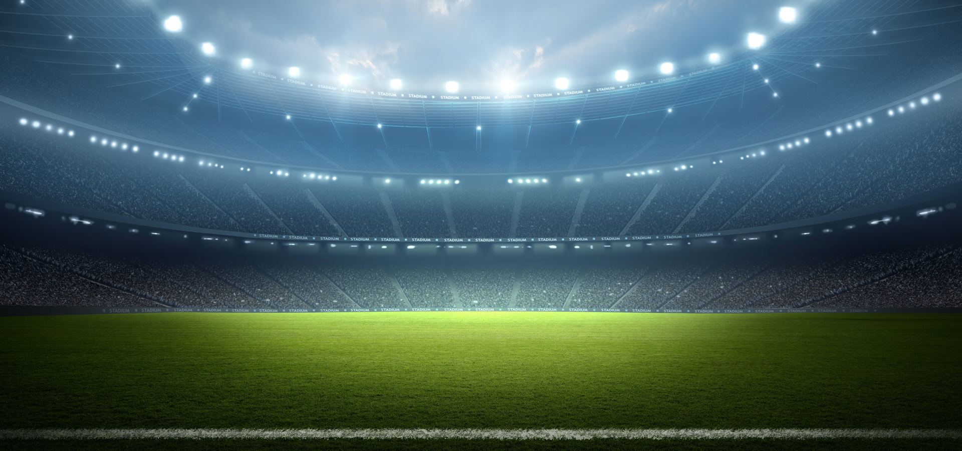 Empty stadium under floodlights